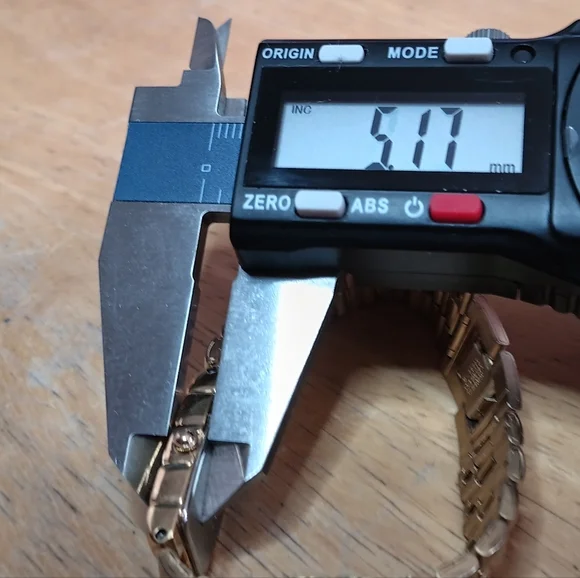 Seiko Ladies Black dial, 2 hand movement gold case and bracelet w/diamond at 12 - Picture 2 of 10